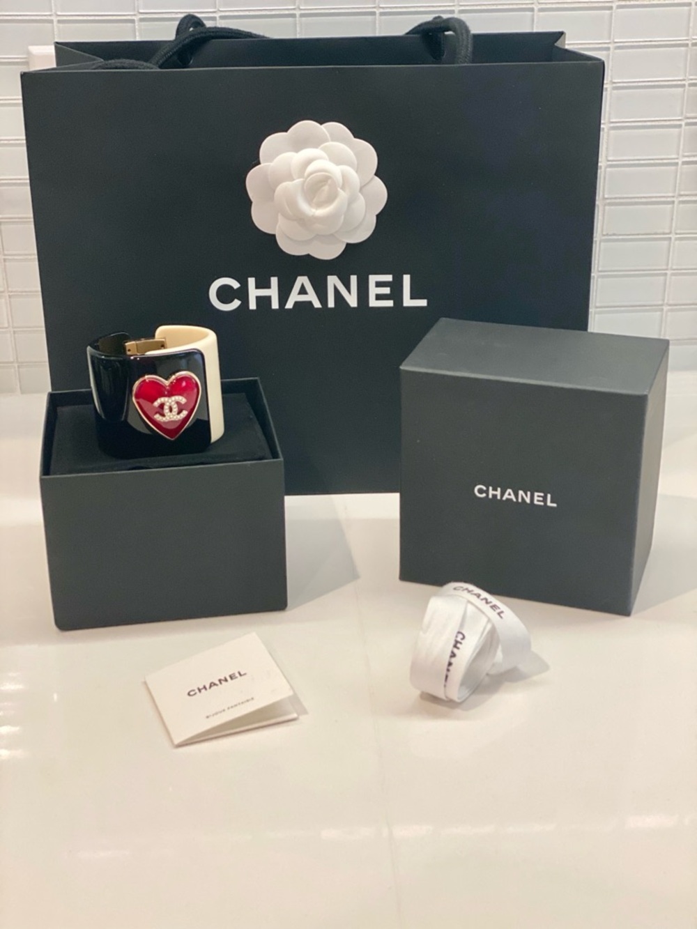 CHANEL Black and White Resin Cuff with Red Heart CC Accent - Picture 8 of 11